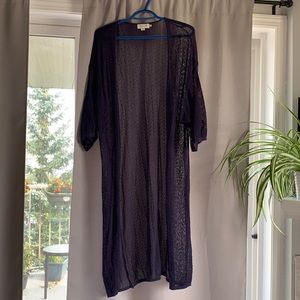 Embroidered long cardigan.